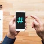 social media concepts with hashtag sign smartphone